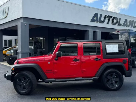 More photos of 2015 Jeep Wrangler Unlimited Sport at AUTOLAND, FL