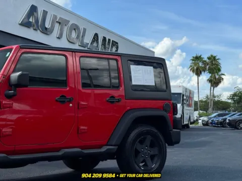 Another view of 2015 Jeep Wrangler Unlimited Sport for sale in Jacksonville, FL at AUTOLAND