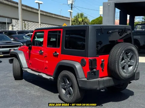 More photos of 2015 Jeep Wrangler Unlimited Sport at AUTOLAND, FL