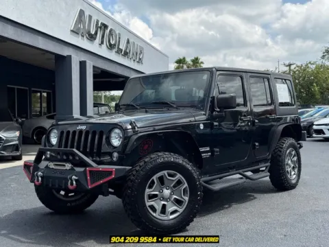 Black 2017 Jeep Wrangler Unlimited Sport for sale in Jacksonville, FL