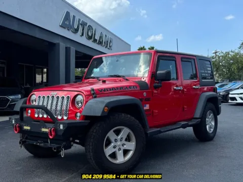 Red 2017 Jeep Wrangler Unlimited Sport for sale in Jacksonville, FL
