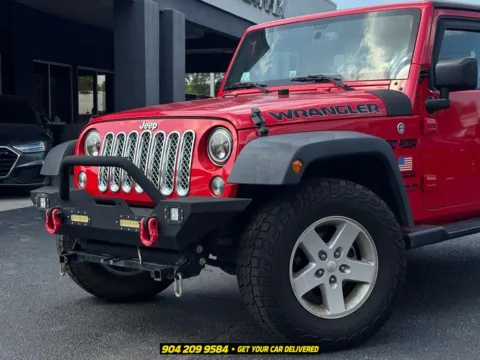 Photos of 2017 Jeep Wrangler Unlimited Sport for sale in Jacksonville, FL at AUTOLAND