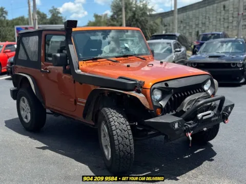 More photos of 2010 Jeep Wrangler Sport at AUTOLAND, FL