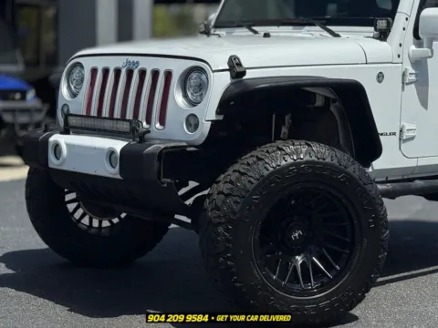 Another view of 2016 Jeep Wrangler Sahara for sale in Jacksonville, FL at AUTOLAND