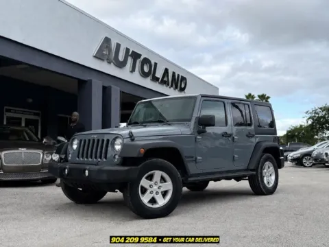 Gray 2015 Jeep Wrangler Unlimited Sport for sale in Jacksonville, FL