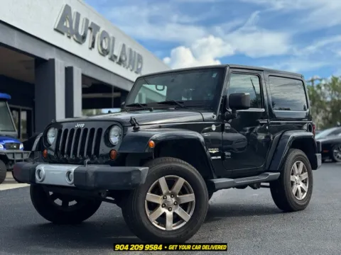 Black 2013 Jeep Wrangler Sahara for sale in Jacksonville, FL