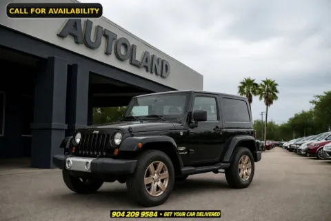 Black 2013 Jeep Wrangler Sahara for sale in Jacksonville, FL