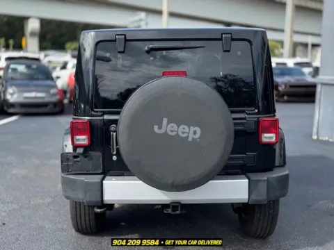 More photos of 2013 Jeep Wrangler Sahara at AUTOLAND, FL