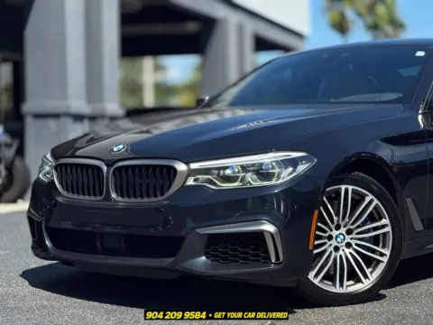 Another view of 2020 BMW 5 Series M550i xDrive for sale in Jacksonville, FL at AUTOLAND