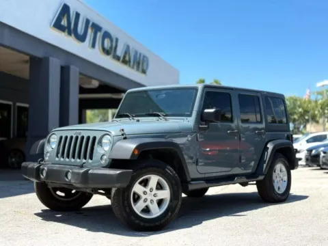 Gray 2015 Jeep Wrangler Unlimited Sport for sale in Jacksonville, FL