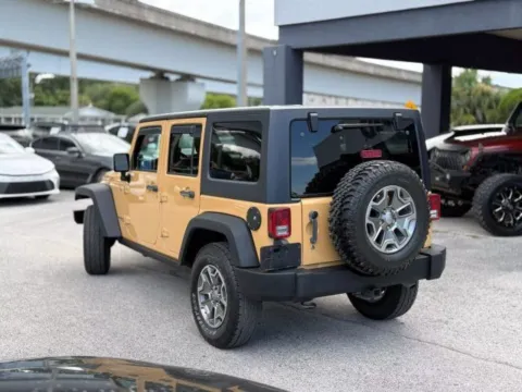 Another view of 2014 Jeep Wrangler Unlimited Rubicon for sale in Jacksonville, FL at AUTOLAND