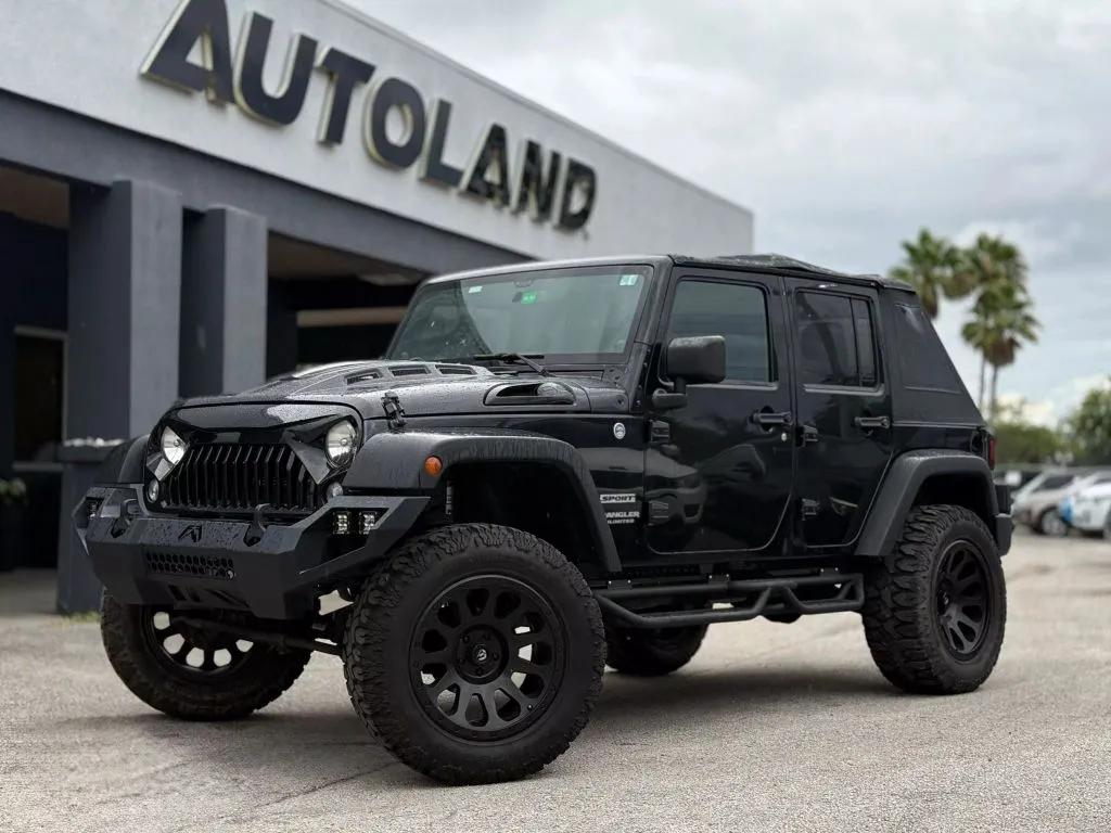 Silver 2014 Jeep Wrangler Unlimited Sport SUV 4D for sale in Jacksonville, FL