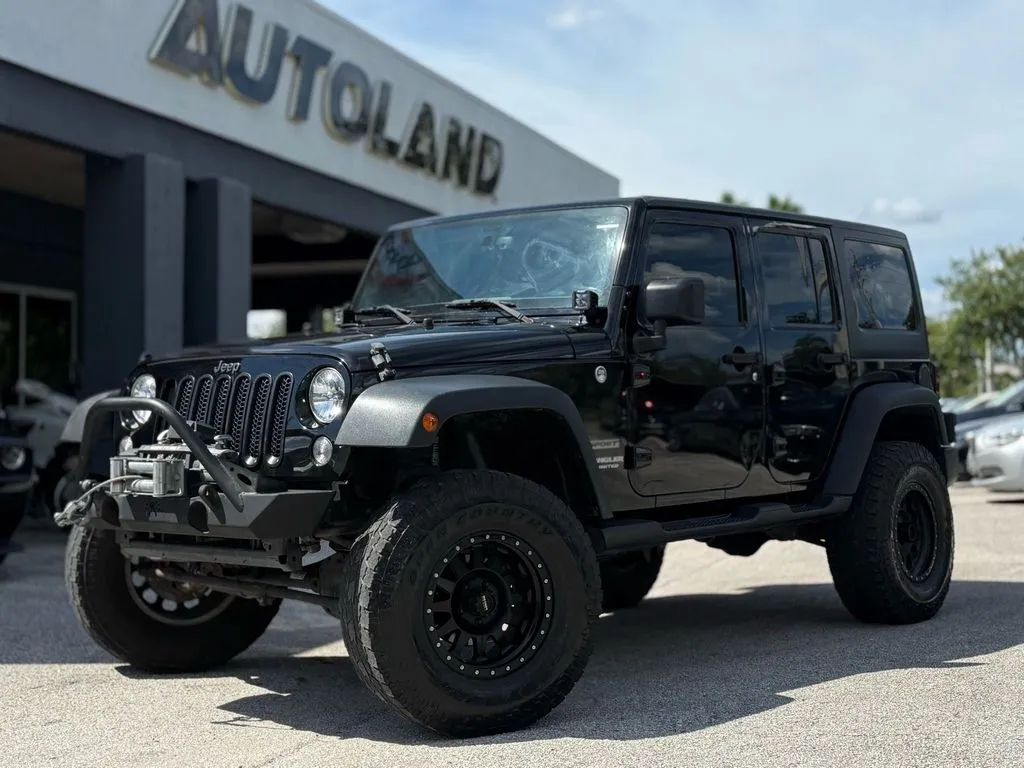 Gray 2015 Jeep Wrangler Unlimited Sport SUV 4D for sale in Jacksonville, FL