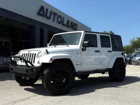 Silver 2014 Jeep Wrangler Unlimited Sahara Sport Utility 4D for sale in Jacksonville, FL