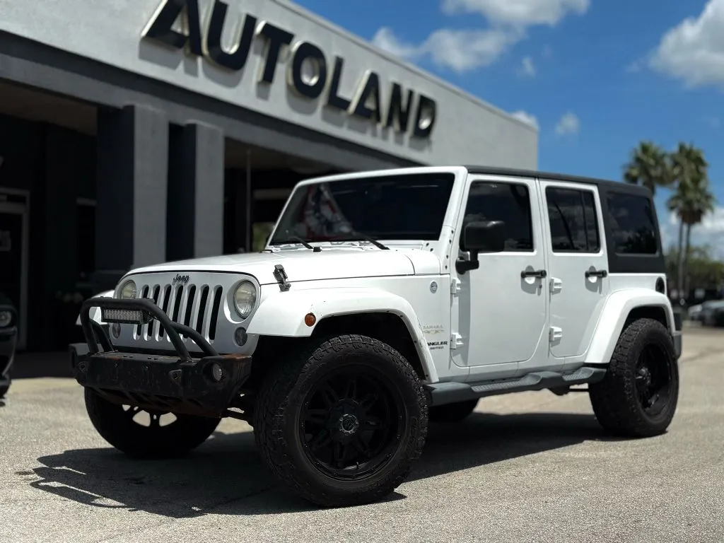 Silver 2014 Jeep Wrangler Unlimited Sahara Sport Utility 4D for sale in Jacksonville, FL