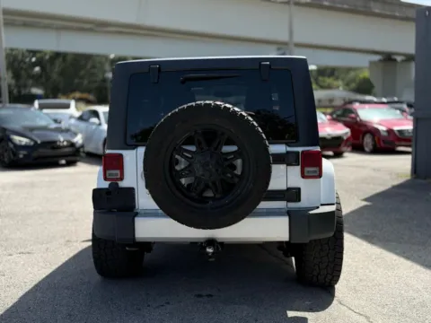 More photos of 2014 Jeep Wrangler Unlimited Sahara at AUTOLAND, FL