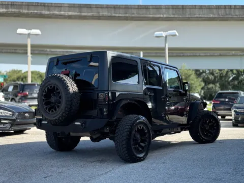 More photos of 2015 Jeep Wrangler Unlimited Sport SUV 4D at AUTOLAND, FL
