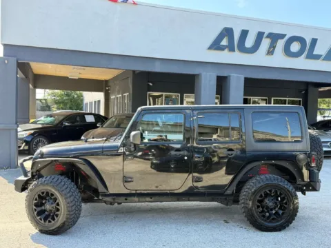 Photos of 2015 Jeep Wrangler Unlimited Sport SUV 4D for sale in Jacksonville, FL at AUTOLAND