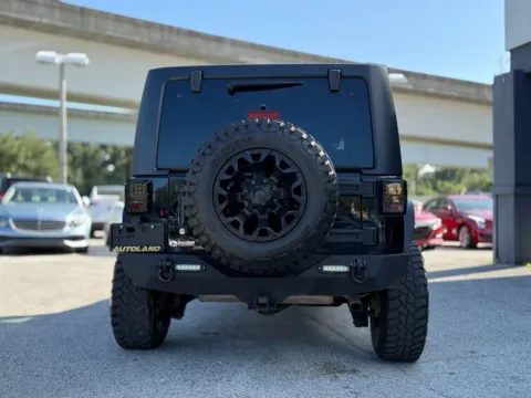 More photos of 2015 Jeep Wrangler Unlimited Sport SUV 4D at AUTOLAND, FL