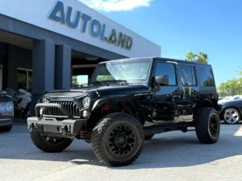 Gray 2015 Jeep Wrangler Unlimited Sport SUV 4D for sale in Jacksonville, FL