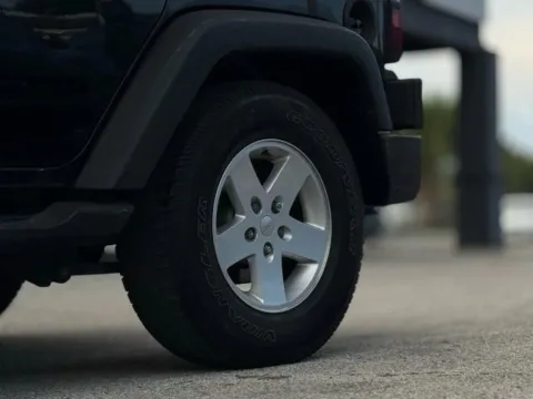 Another view of 2010 Jeep Wrangler Unlimited Sport for sale in Jacksonville, FL at AUTOLAND