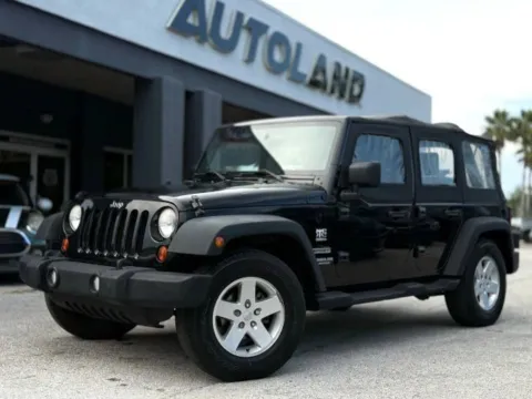 Black 2010 Jeep Wrangler Unlimited Sport for sale in Jacksonville, FL