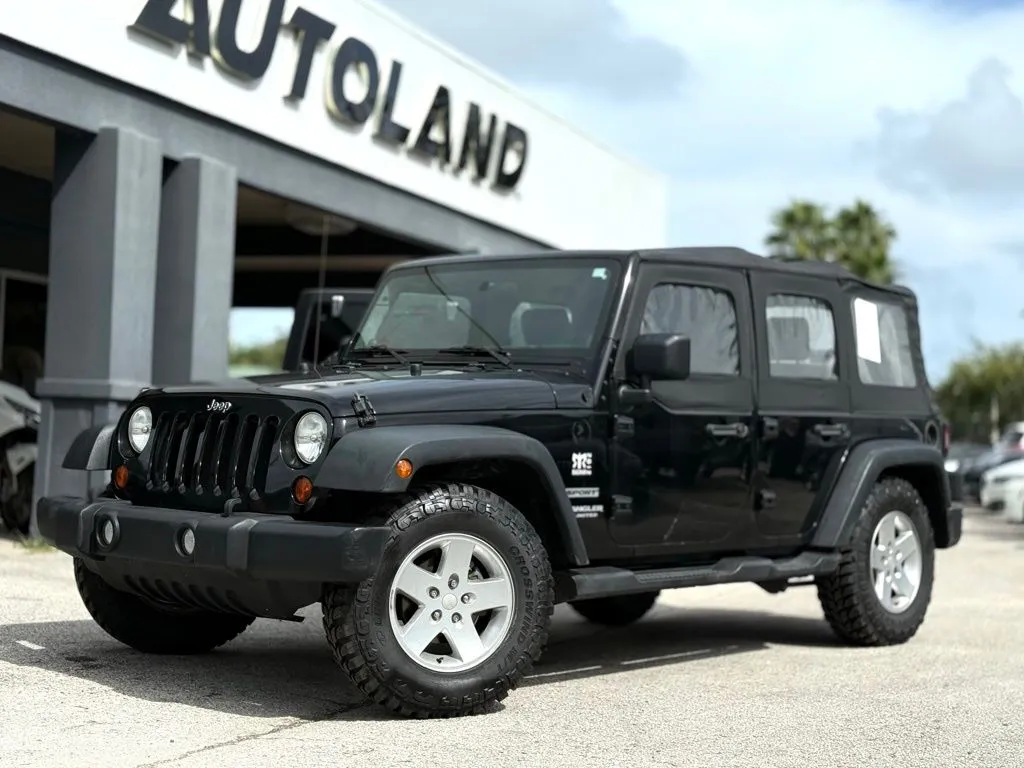 Black 2010 Jeep Wrangler Unlimited Sport for sale in Jacksonville, FL