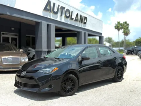 Red 2019 Toyota Corolla LE Sedan 4D for sale in Jacksonville, FL