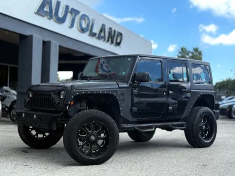 Silver 2016 Jeep Wrangler Unlimited Sport SUV 4D for sale in Jacksonville, FL