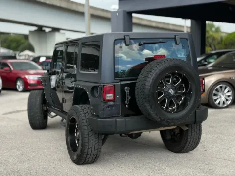 Another view of 2016 Jeep Wrangler Unlimited Sport SUV 4D for sale in Jacksonville, FL at AUTOLAND