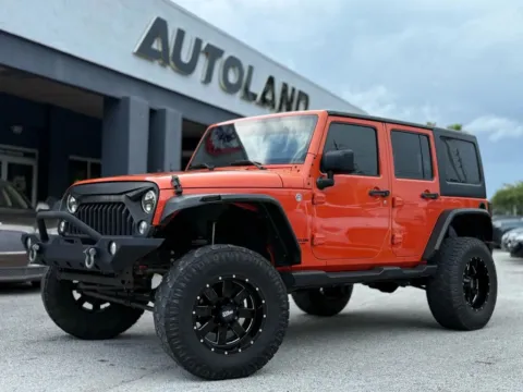 Gray 2015 Jeep Wrangler Unlimited Sport SUV 4D for sale in Jacksonville, FL