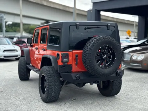 Another view of 2015 Jeep Wrangler Unlimited Sport SUV 4D for sale in Jacksonville, FL at AUTOLAND
