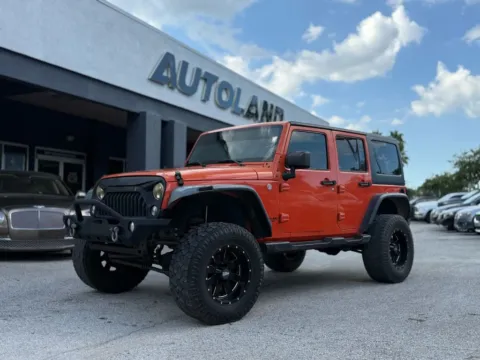 Gray 2015 Jeep Wrangler Unlimited Sport SUV 4D for sale in Jacksonville, FL
