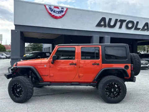 Photos of 2015 Jeep Wrangler Unlimited Sport SUV 4D for sale in Jacksonville, FL at AUTOLAND