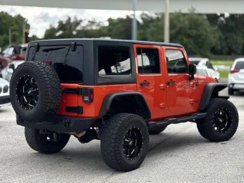 More photos of 2015 Jeep Wrangler Unlimited Sport SUV 4D at AUTOLAND, FL