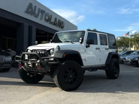 Silver 2016 Jeep Wrangler Unlimited Rubicon Hard Rock Sport Utility 4D for sale in Jacksonville, FL