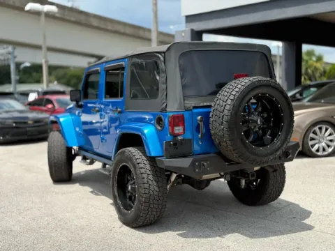 Another view of 2015 Jeep Wrangler Unlimited Sahara Sport Utility 4D for sale in Jacksonville, FL at AUTOLAND