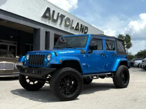 Gray 2015 Jeep Wrangler Unlimited Sahara Sport Utility 4D for sale in Jacksonville, FL
