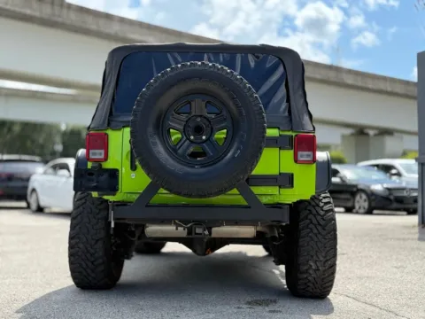 More photos of 2013 Jeep Wrangler Sport at AUTOLAND, FL