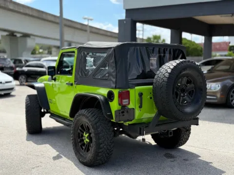Another view of 2013 Jeep Wrangler Sport for sale in Jacksonville, FL at AUTOLAND