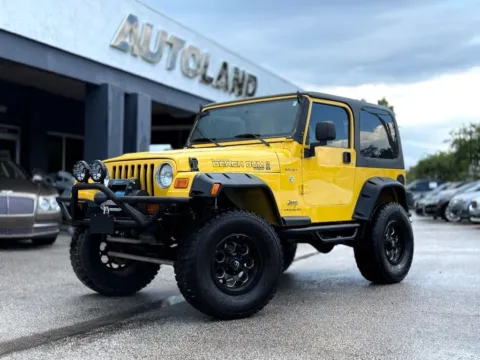 Yellow 2003 Jeep Wrangler Sport for sale in Jacksonville, FL