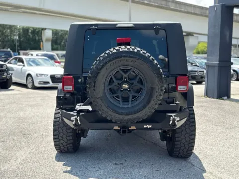 More photos of 2014 Jeep Wrangler Sport at AUTOLAND, FL