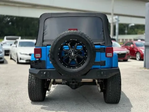 More photos of 2015 Jeep Wrangler Unlimited Sahara at AUTOLAND, FL