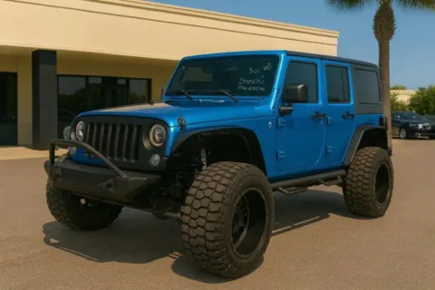 Blue 2016 Jeep Wrangler Unlimited Sport for sale in Jacksonville, FL