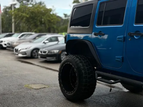 Another view of 2016 Jeep Wrangler Unlimited Sport for sale in Jacksonville, FL at AUTOLAND