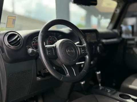More photos of 2015 Jeep Wrangler Unlimited Sport at AUTOLAND, FL