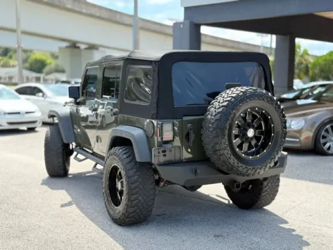 Another view of 2015 Jeep Wrangler Unlimited Sport for sale in Jacksonville, FL at AUTOLAND