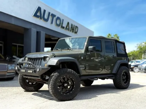 Green 2015 Jeep Wrangler Unlimited Sport for sale in Jacksonville, FL