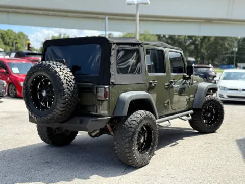 More photos of 2015 Jeep Wrangler Unlimited Sport at AUTOLAND, FL