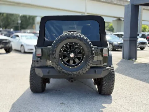 More photos of 2015 Jeep Wrangler Unlimited Sport at AUTOLAND, FL